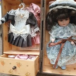 Porcelain Doll In Chest