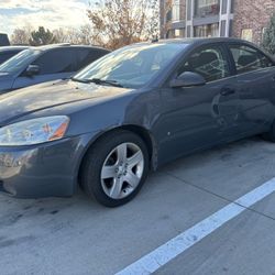 2008 pontiac G6 sedan 4 door 4 cylinder 2.4 liter automatic FWD runs and drives good 130k miles only thing was parked on the street and someone side s