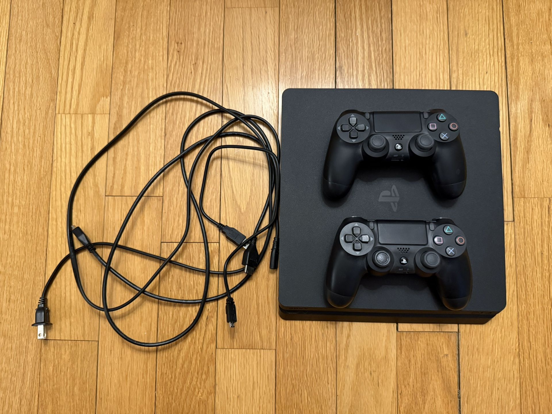 PlayStation 4 with 2 Controllers