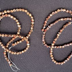 Two Strings Of Swarovski Metallic Beads -Rose gold