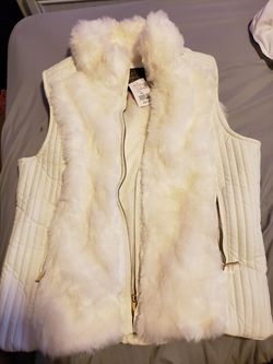White faux fur vest