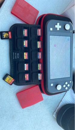 Nintendo Switch lite includes games and accessories read description
