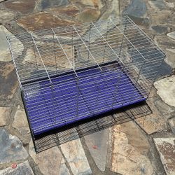 2.5 ft X 1.5 ft pet cage with slide-out waste pan
