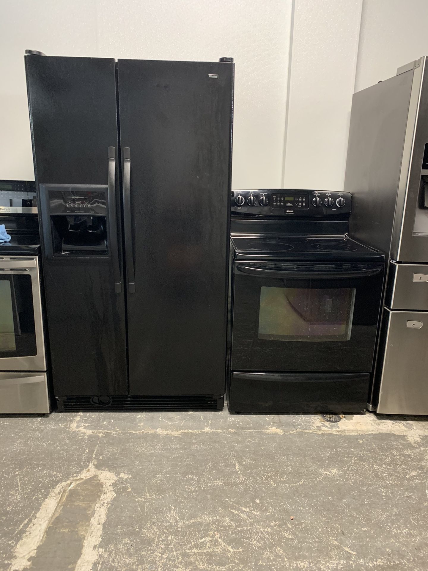 Black side by side refrigerators