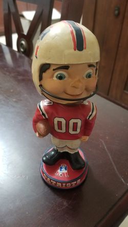Antique patriots bobblehead doll.