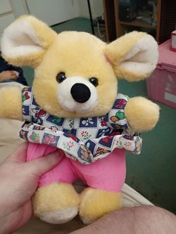 A Female Yellow Mouse plush toy