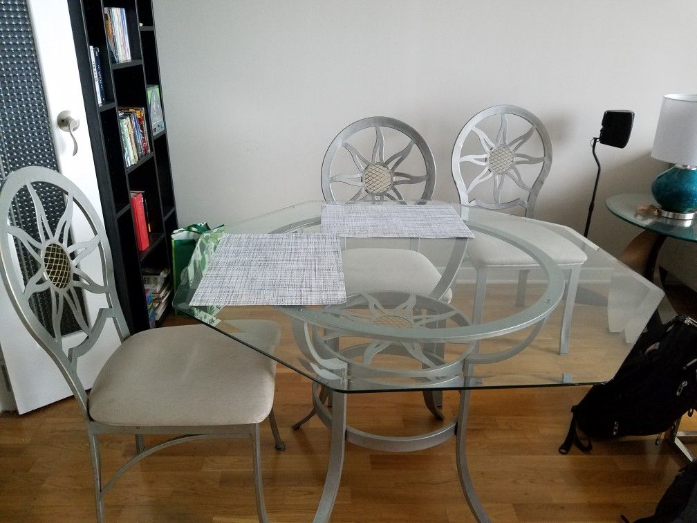 Glass table and 4 chairs