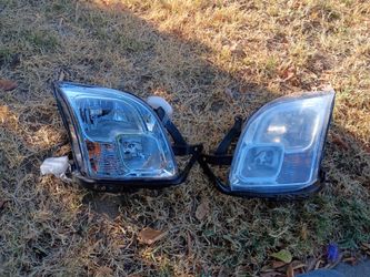 06-09 Ford fusion headlights with bulbs included