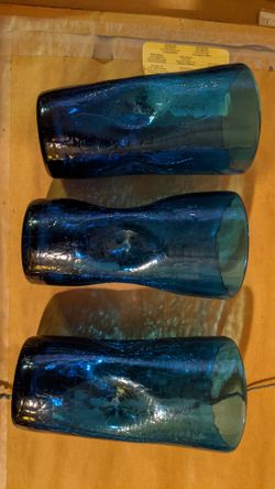 Three old glasses with unusual design