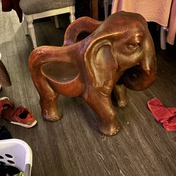 Hand carved elephant chair