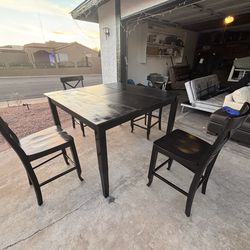 High top dinner table with leaf and 4 chairs,can deliver