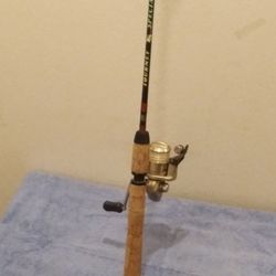 FISHING POLE & SOLSTACE REEL