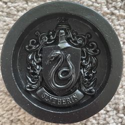 2.5”-diameter x 1”-tall Harry Potter’s Slytherin Paperweight