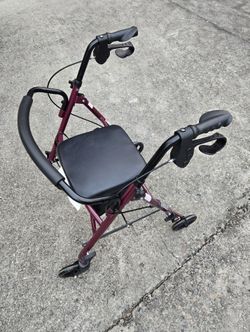 LIKE NEW MEDLINE WALKER WITH SEAT & STORAGE