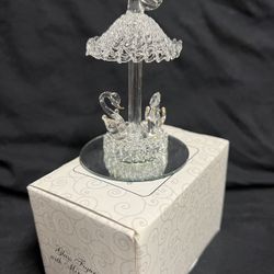 Vintage spun glass carousel with swans