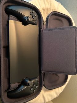 black playstation portal with official white case