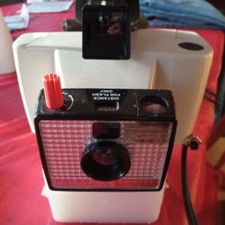 Two Poloraid Cameras 