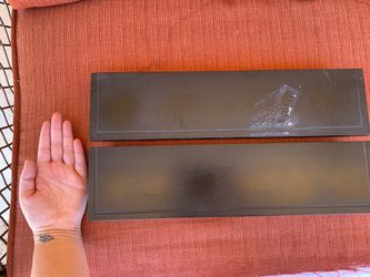 Two black floating shelves