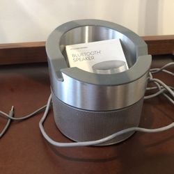 Hi Tech blue tooth speaker...set IPad in it. Excellent sound. Use while cooking and entertaining. Two USB ports.