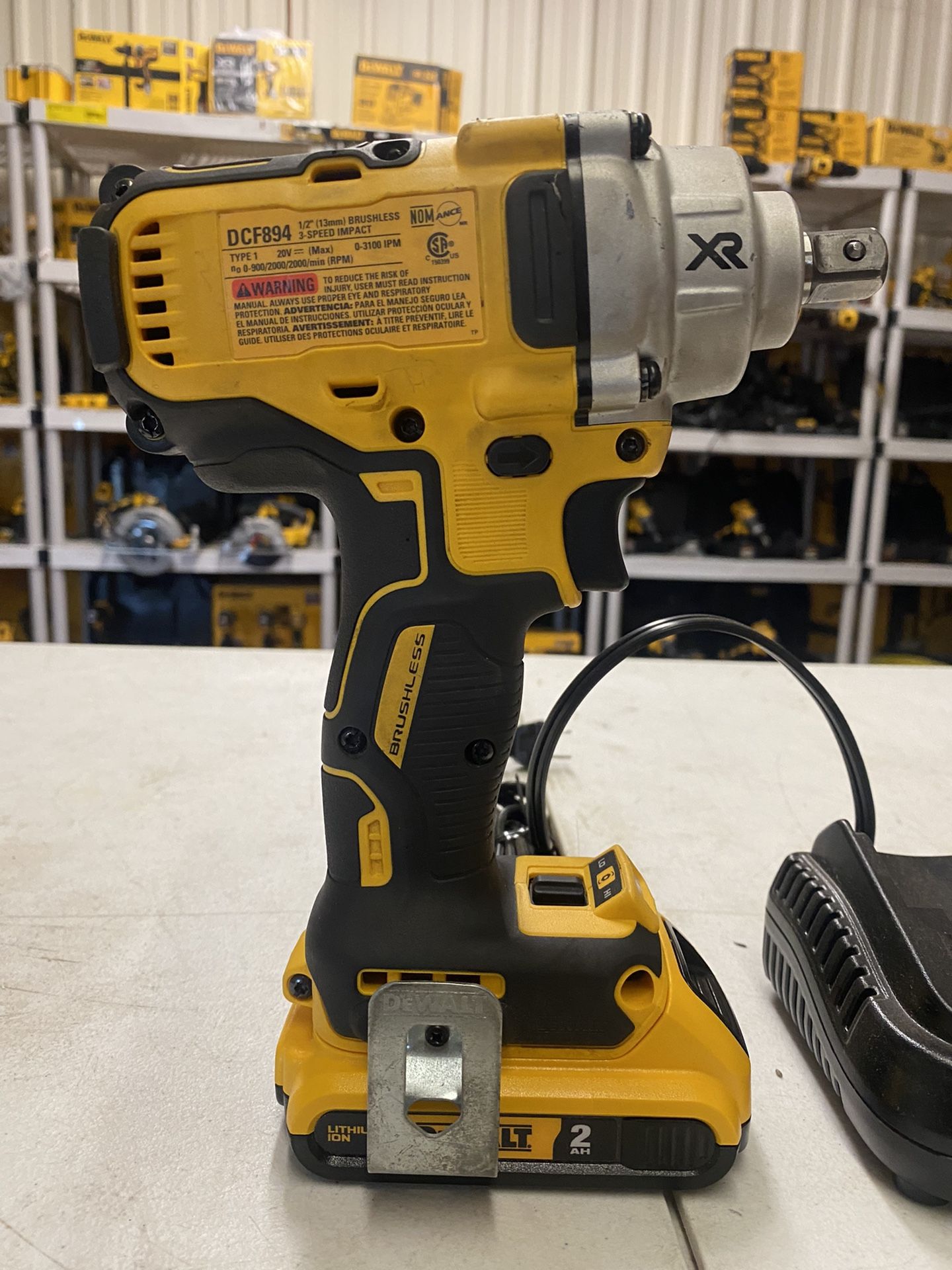 20-Volt MAX XR Cordless Brushless 1/2 in. Mid-Range Impact Wrench Hog Ring Anvil, with batter Charge