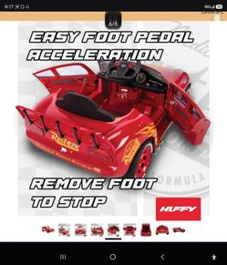 New never used Huffy Cars Lightning McQueen 6V Ride-On Toy Car with Headlights & Engine Sounds, Foot Pedal Drive, Up to 2.5 MPH