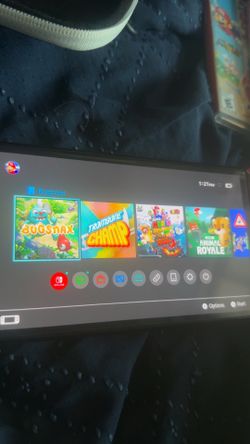 Nintendo Switch OLED Bundle - 2 Games and Accessories