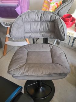 2 swivel cushioned bar chairs