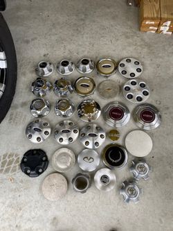 variety of center caps (Ford, Honda,Jeep,Nissan, Cadillac and Chevrolet)