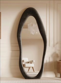 Wavy mirror, new in box, black.