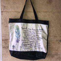 Inspirational and feather large bag with a zipper compartment in great condition. See all pics for details and dimensions