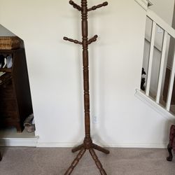 Vintage Solid Wood Spindle Carved Coat Rack, excellent condition, 2” diameter body, 70”H x 26”W bottom x 14”W top, 6 hanger rods.