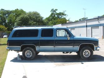 1980-87 Chevrolet Silverado. LH kick panel. Gray. Suburban . GMC Sierra. C20. C30.