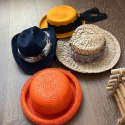 Four women’s hats Sold Together $20