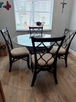 Gray wood and rattan kitchen table