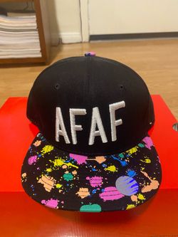 Black snapback W/ splatter paint brim