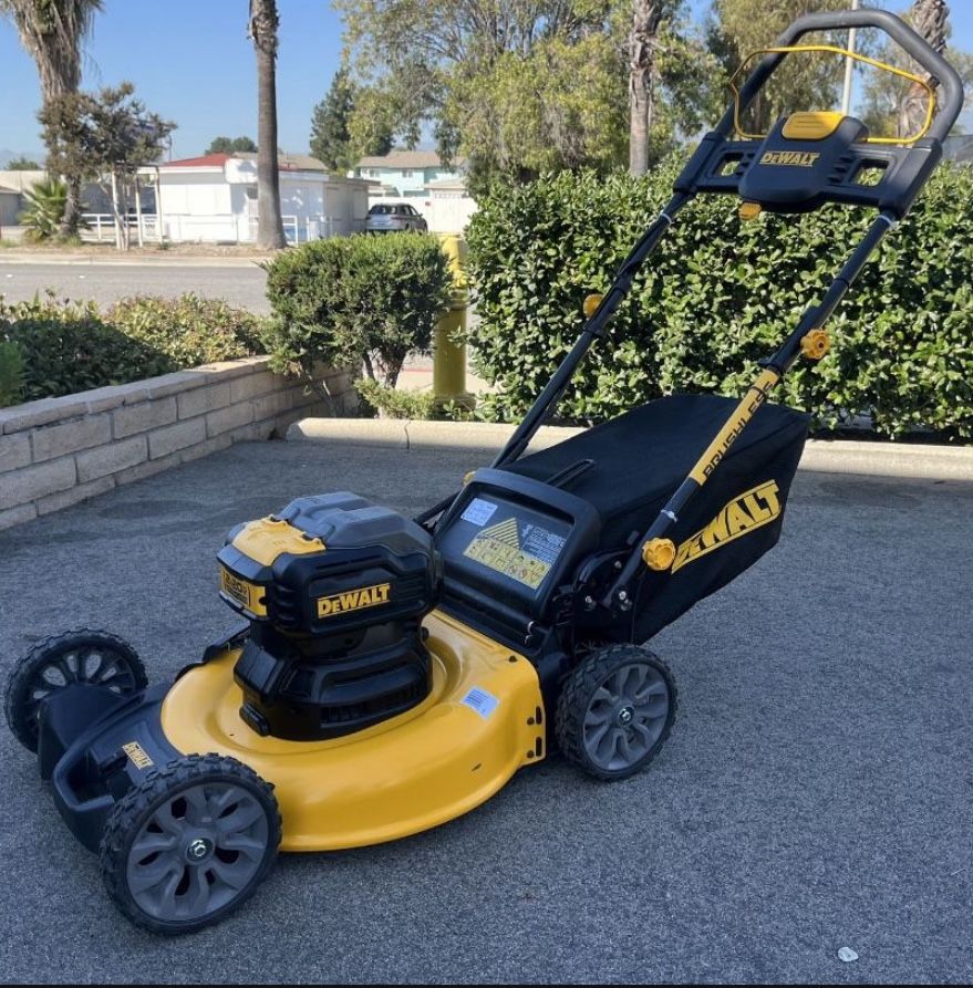 Brand new DEWALT 20V MAX Lawn Mower: cordless, rear-wheel drive, push type. Batteries and charger not included.