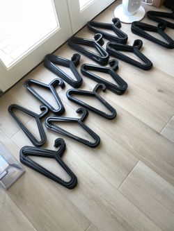 Free 100 + Black Clothes Hangers