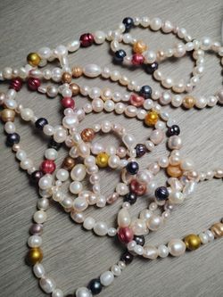 39 3/4 inches of genuine pearls. $10