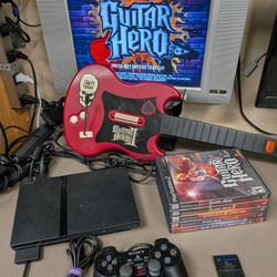 PlayStation 2 PS2 Slim With One Controller, Guitar Controller And 5 Guitar Hero Games