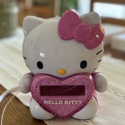 Hello Kitty AM/FM Projection Clock Radio With Battery Backup