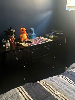 Black dresser $100 near midway