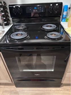 Whirlpool Electric Rangewith Broan Range Hood