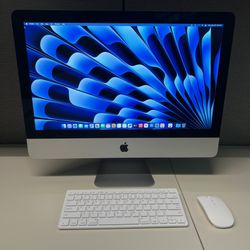 21.5” iMac Late 2013 (14,3) Optional Keyboard & mouse.