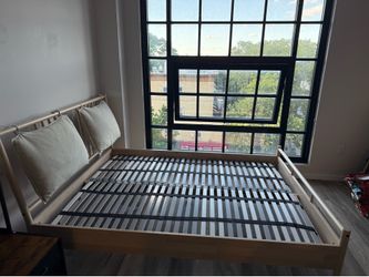 IKEA Queen size bed frame with slatted base included