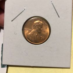 One Penny ,3 Quarters , One Dollar Coin 