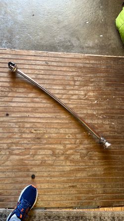 Barely used curved shower rod