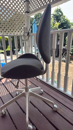 Lightly used office, dust chair, gray, and white reclining