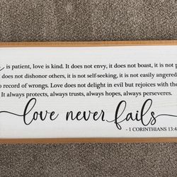 Love never fails hanging wall art