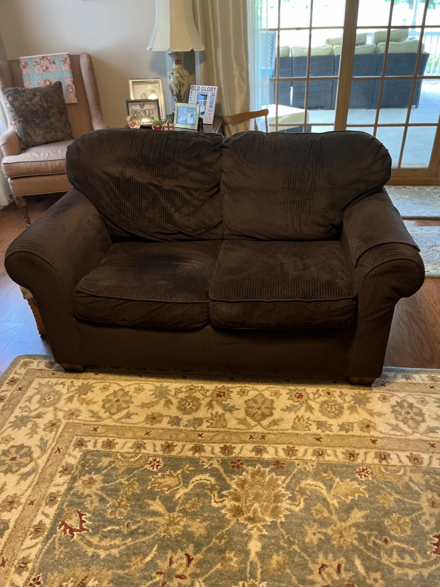 Loveseat And Ottoman With Pillows