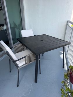 Outdoor table with 2 chairs